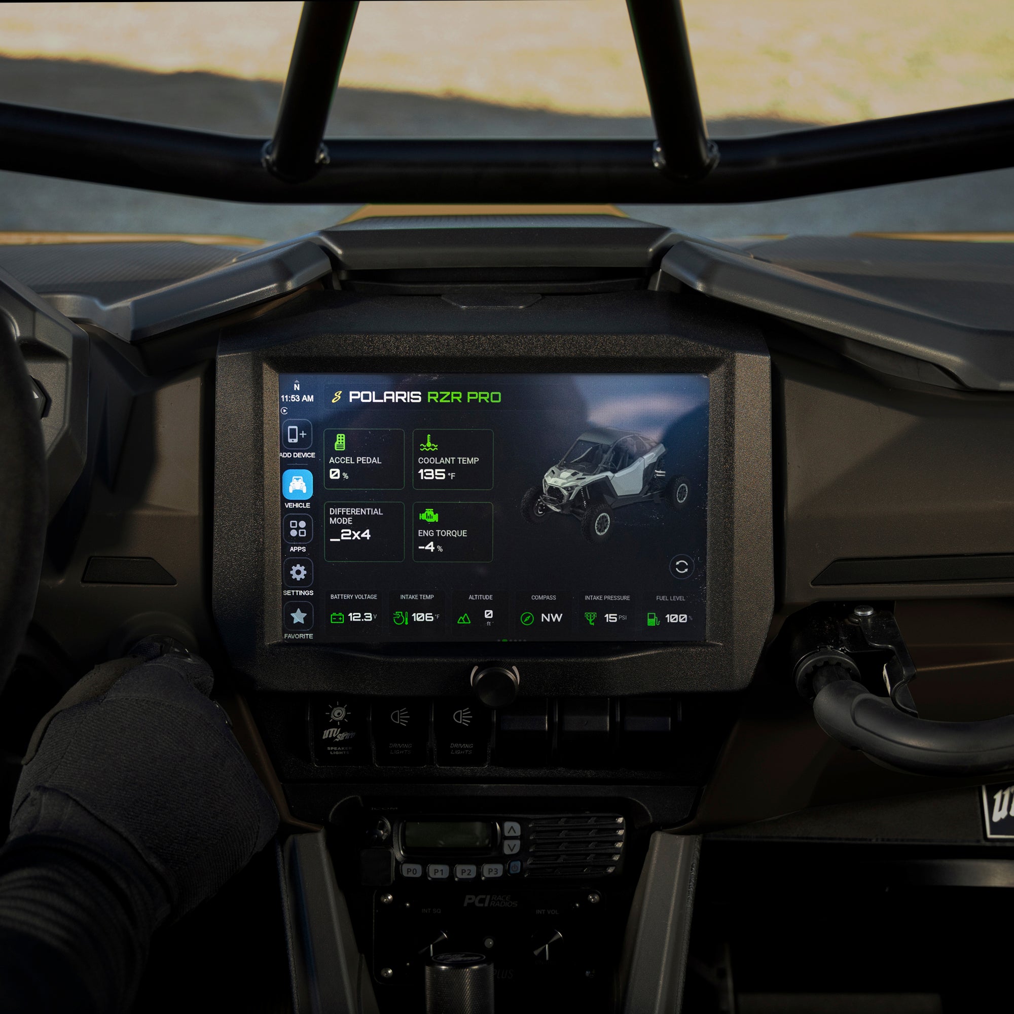 Driver’s view of the Stinger Horizon XTR in a Polaris RZR Pro dash, roll cage overhead, showing the vehicle data screen