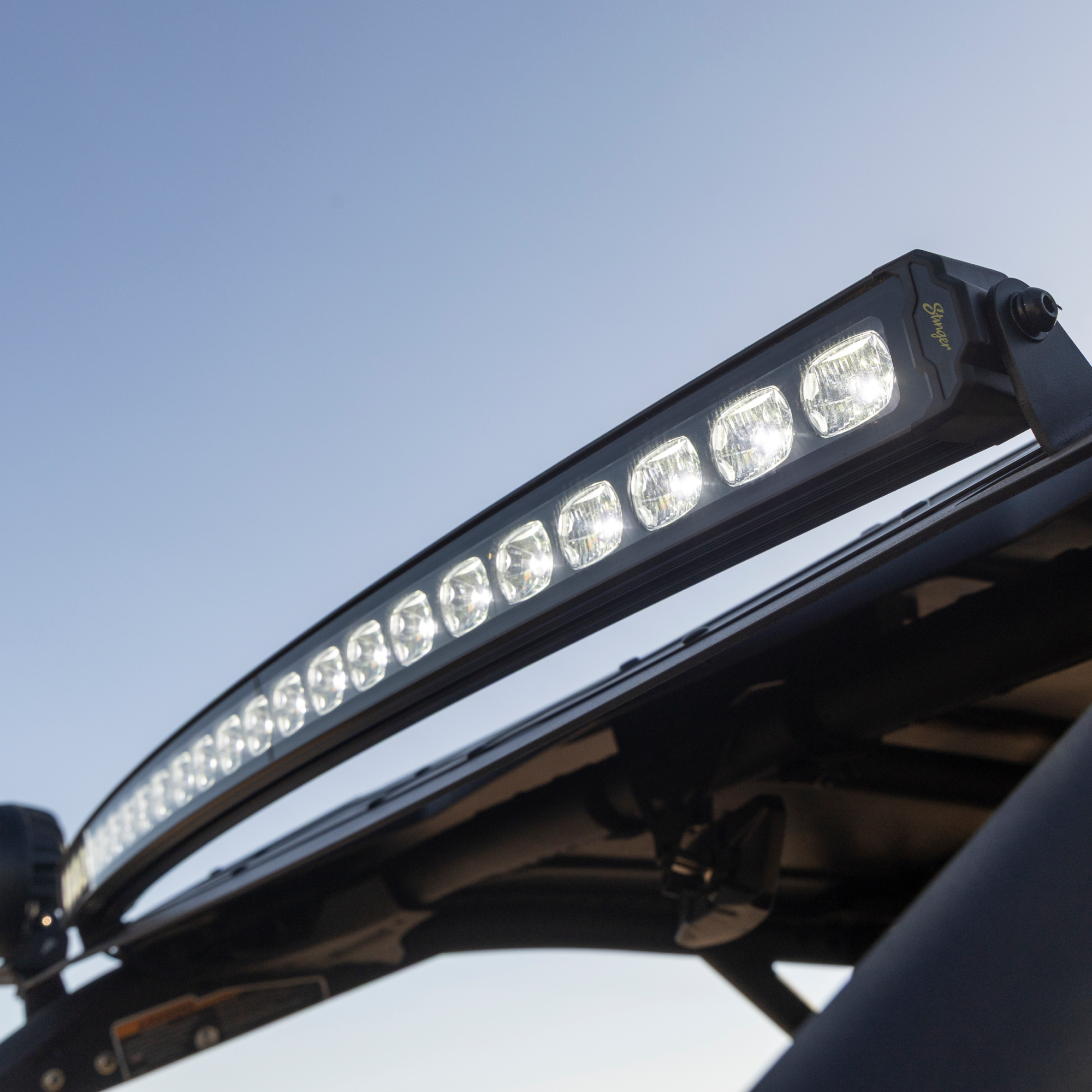 LED light bar on a vehicle with a clear blue sky background