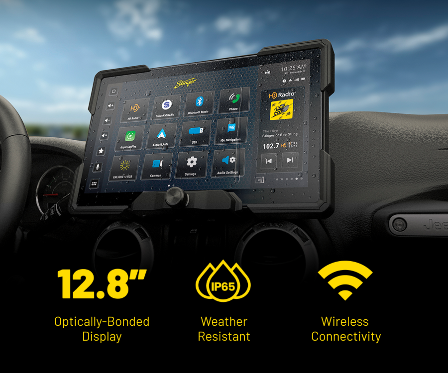 Stinger 12.8-inch optically bonded touchscreen radio in a Jeep Wrangler JK dash with water droplets on the screen, showing IP65 weather resistance, HD Radio, Apple CarPlay and Android Auto.