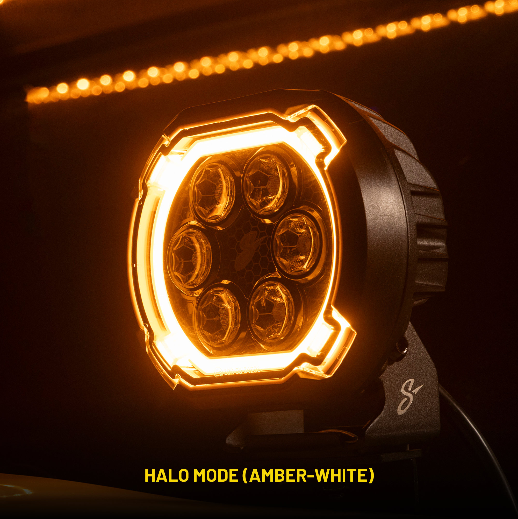 Round LED off road light with illuminated amber halo ring