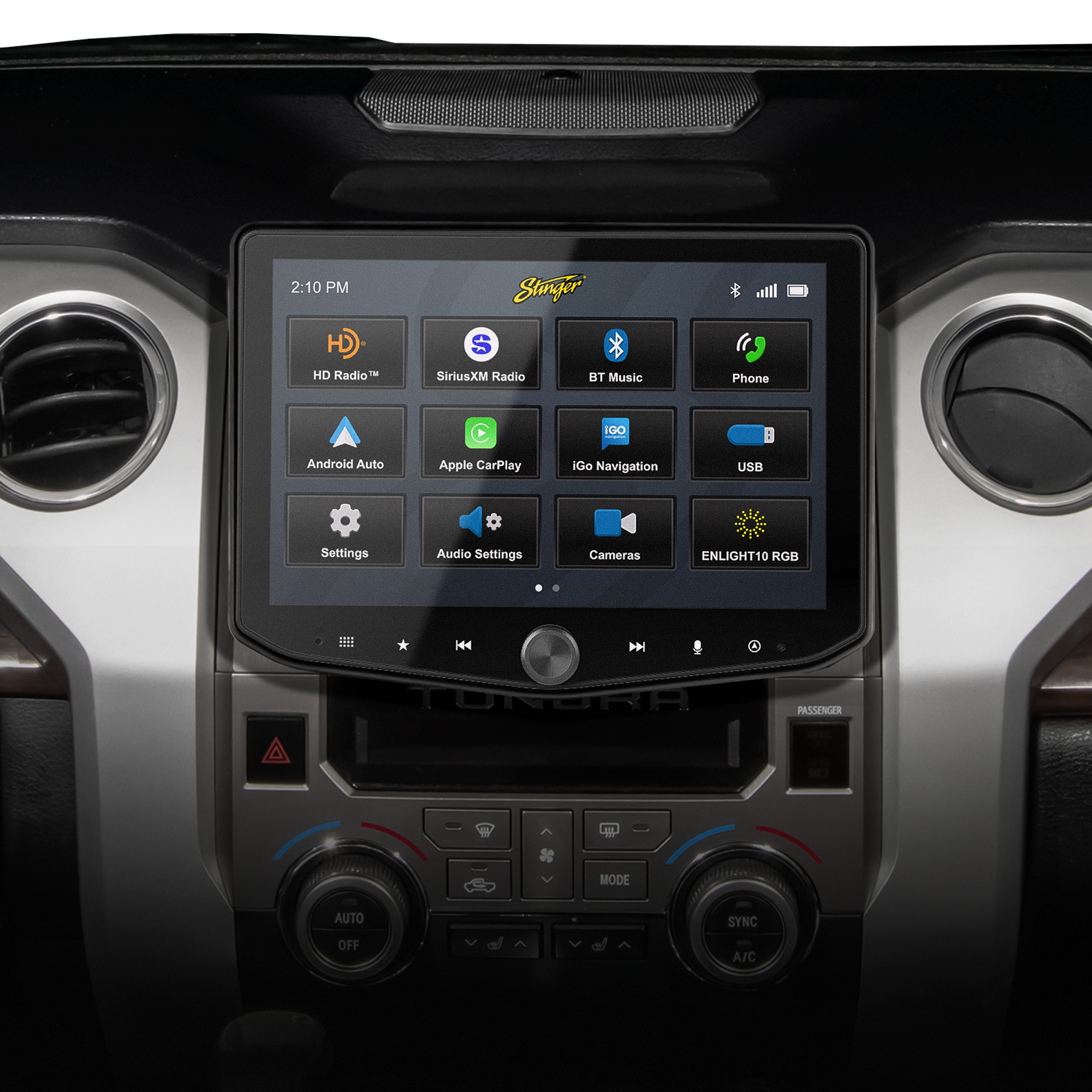 A car's center console featuring a large touchscreen display with various app icons, mounted on a silver and black dashboard.