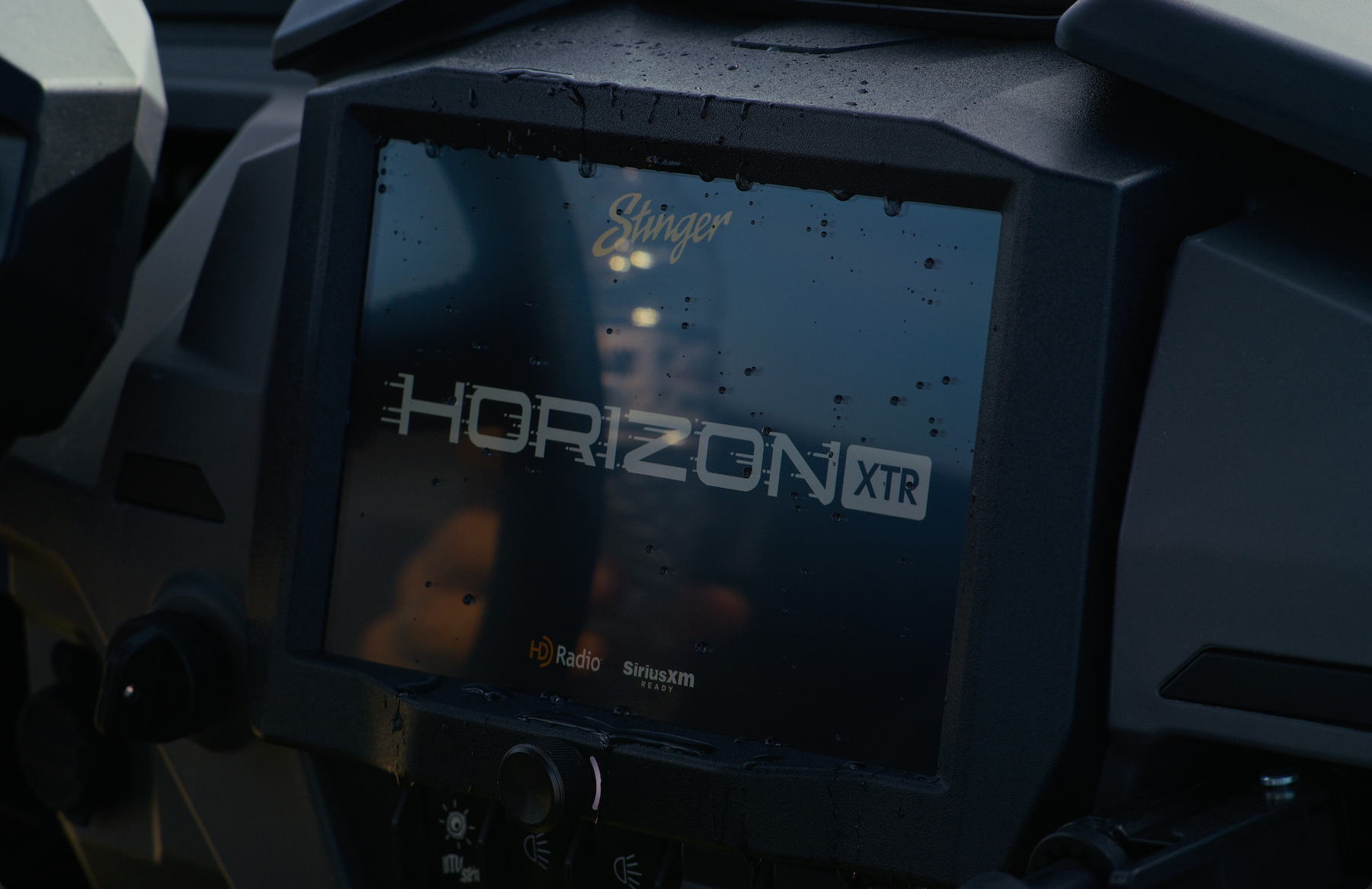 Stinger Horizon XTR display screen mounted in a vehicle dashboard