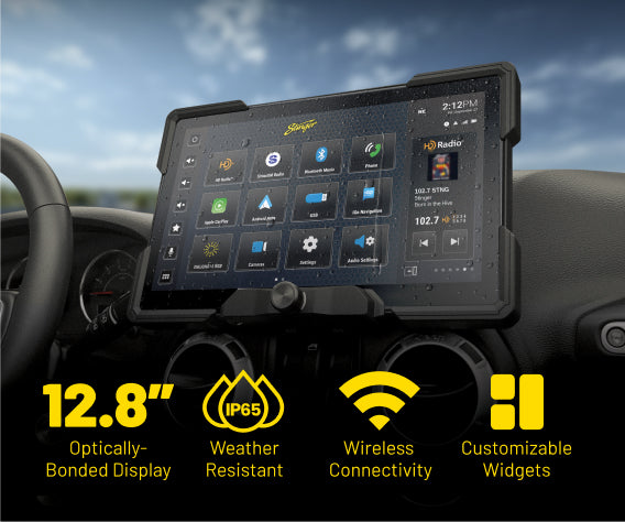 Stinger HORIZON12 12.8" radio in a Jeep dash, water beading on the screen, HD Radio widget playing Born in the Hive by Stinger. Features: optically-bonded display, IP65 weather resistant, wireless connectivity, customizable widgets.