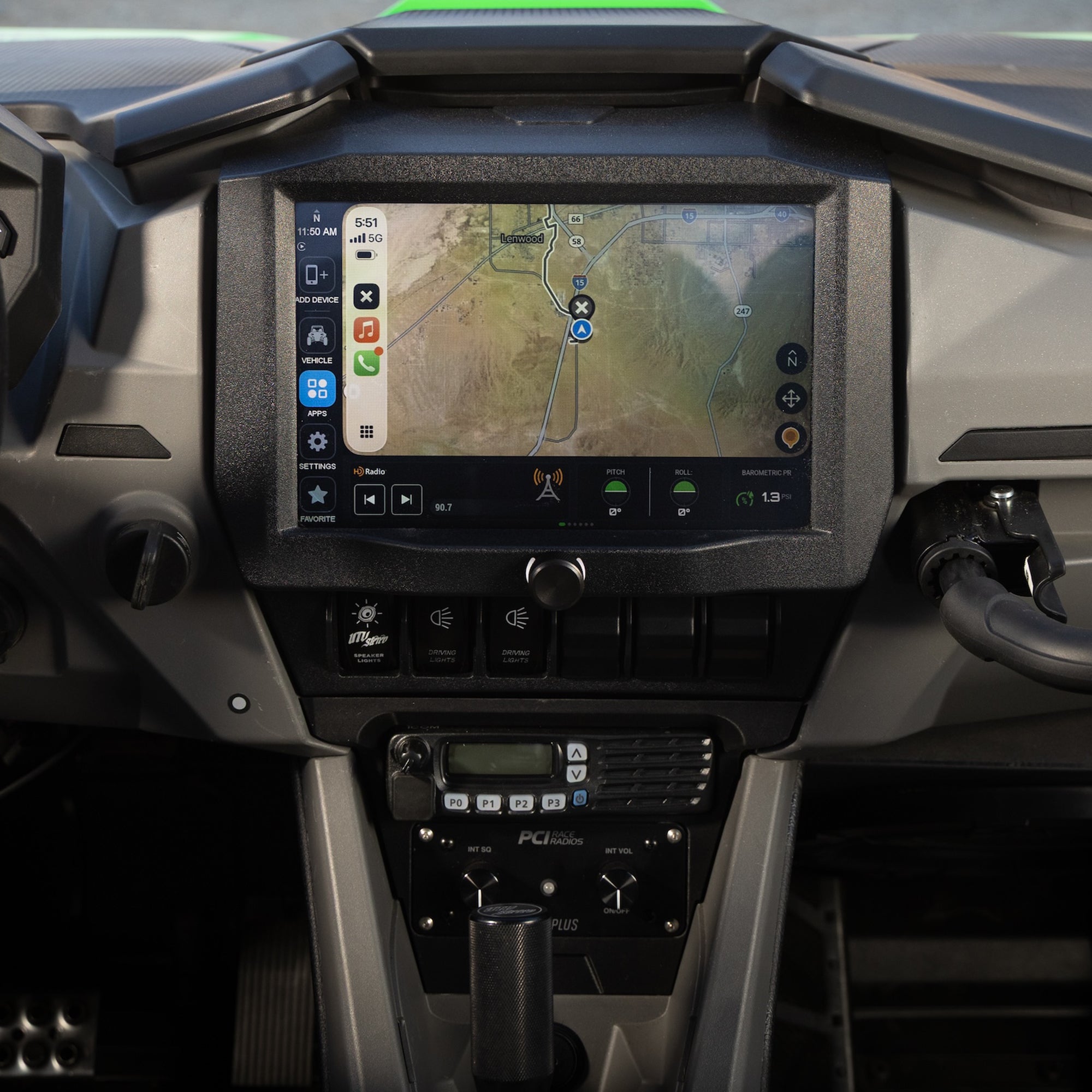 A black in-dash car stereo touchscreen media system installed in a vehicle dashboard, displaying a GPS navigation map on the screen.